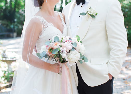 bride and groom pink classic bouquet and boutonniere wedding flowers